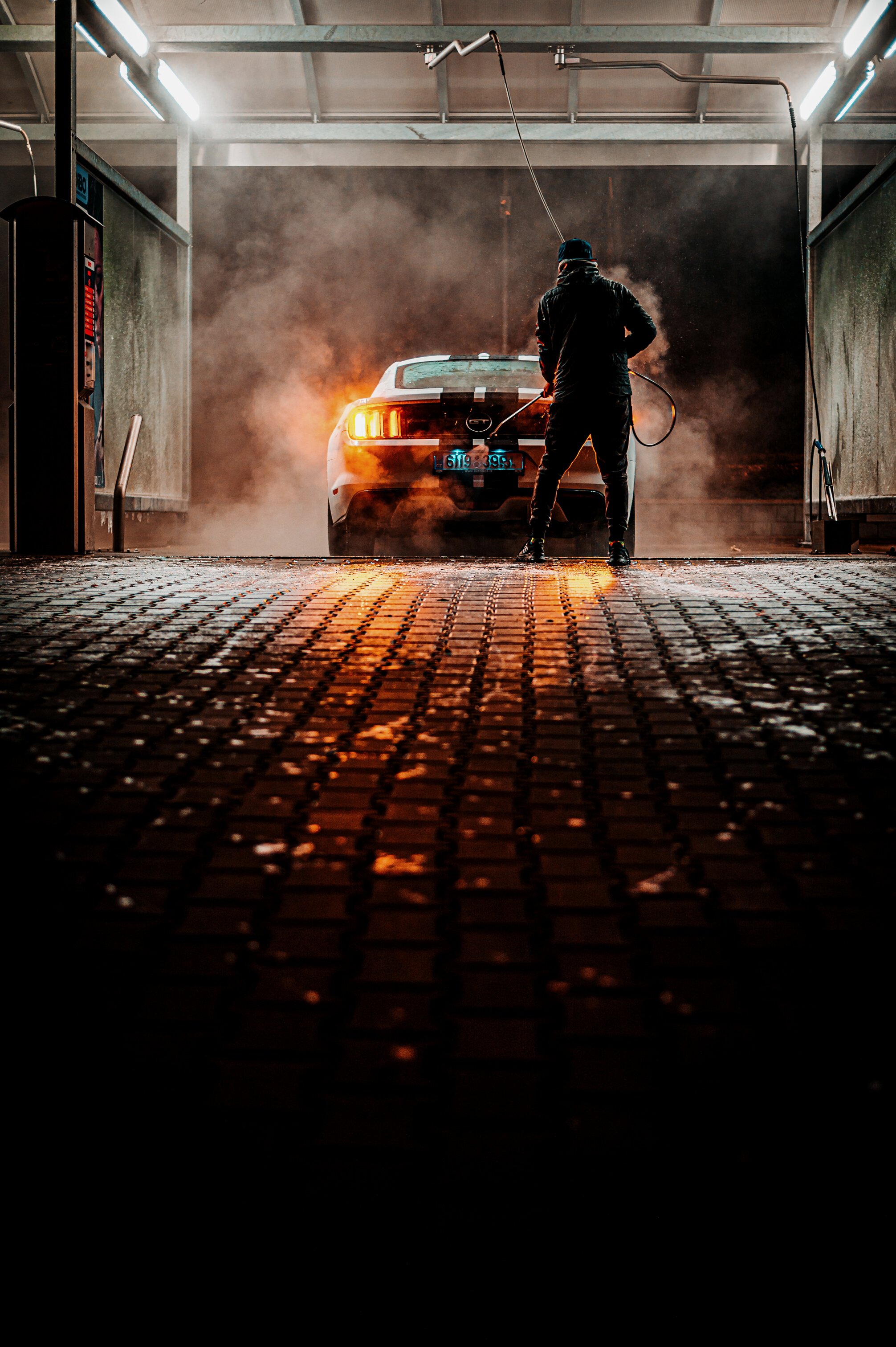 Car Being Wash by Man